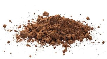 Pile cocoa powder isolated on white background photo