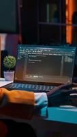 vertical vídeo africano americano eso especialista trabajando con codificación idioma y infografía, mejorando servidor seguridad en terminal ventana. joven programación estudiante aprendizaje a utilizar código y hardware. cámara una. video