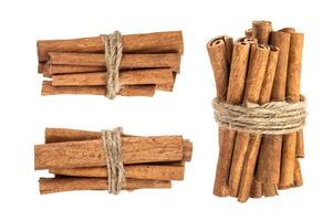 Cinnamon sticks isolated on white background with clipping path photo