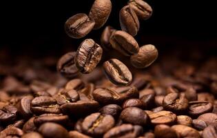 Falling coffee beans. Dark background with copy space photo