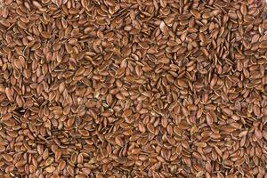 Flax seeds background, linseed texture photo
