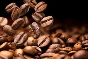 Falling coffee beans. Dark background with copy space photo