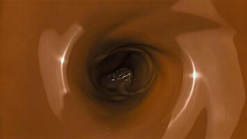 A whirlpool of cocoa. Top view. Macro background. Filmed on a high-speed camera at 1000 fps. High quality FullHD footage video