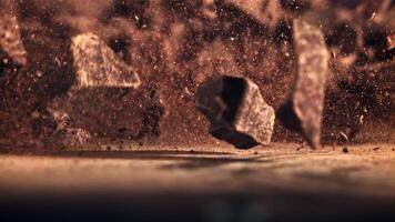 Pieces of chocolate rotate in flight. Against a dark background. Filmed on a high-speed camera at 1000 fps. video