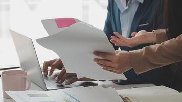 Finance manager meeting discussing company growth project success financial statistics, professional investor working start up project for strategy plan with document, laptop and digital tablet. video