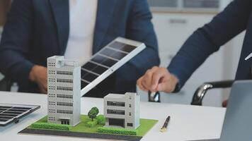 Solar panel green or renewable energy business concept, Group of business people meeting on solar cell panel technology and planning together video