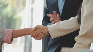 Business handshake for teamwork of business merger and acquisition,successful negotiate,hand shake,two businessman shake hand with partner to celebration partnership and business deal concept video