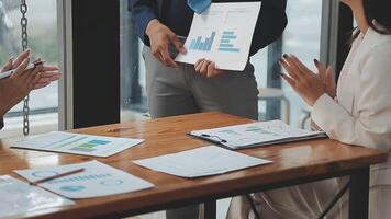Finance manager meeting discussing company growth project success financial statistics, professional investor working start up project for strategy plan with document, laptop and digital tablet. video