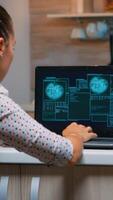 Hacker failing matching password and nervously closing laptop in midnight. Woman programmer writing a dangerous malware for cyber attacks using performance computer late at night. photo