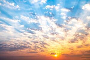 Sky, sunrise, sunset, luxury soft gradient orange gold clouds and gold sunlight between group of blue clound sky perfect for the background, take in everning,Twilight, high definition landscape photo