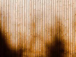 Striped wood background with abstract shadows photo