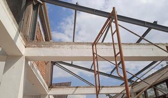 Structure of steel for building construction on sky background. photo