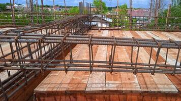 Construction worker Making Reinforcement steel rod photo