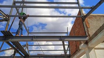 Structure of steel for building construction on sky background. photo