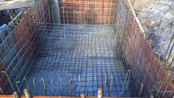 Steel wire mesh rebar, metal framework reinforcement for basement elevator. photo