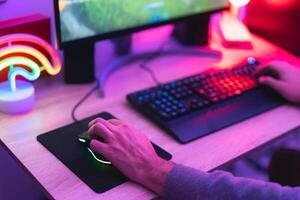 Young gamer playing online video games while streaming on social media - Youth people addicted to new technology game photo