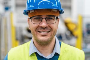 Engineer man working inside robotic factory - Automation industry concept photo