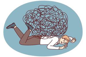 Depressed businessman lies on ground face down under heavy load of tangled lines vector