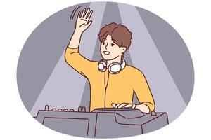 Male DJ with headphones waving to greet club goers and cheer up dancing people. Vector image