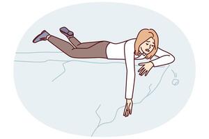 Weakened woman in business clothes lies on edge of cliff stretching hand down vector