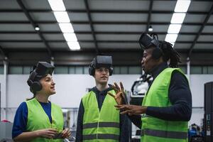 Team of engineers having simulation experience with futuristic virtual reality glasses inside robotic factory - Tech industry and metaverse concept photo