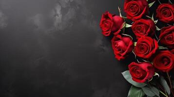 AI generated Minimalistic black background on which lies a bouquet of red roses with large copyspace area photo