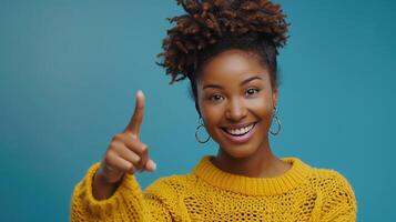 ai generado radiante joven africano mujer en amarillo suéter señalando hacia arriba, alegre expresión. foto