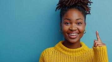 AI generated Radiant young African woman in yellow sweater pointing upwards, joyful expression. photo