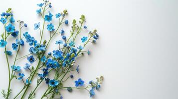 AI generated A bouquet of forget-me-not flowers lies on the left on a white minimalistic background photo