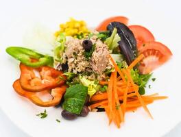 Tuna, tomato, carrot and black olives salad photo