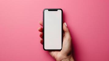AI generated Close-up hand holding a phone with a blank white screen turned towards the camera. pink background photo