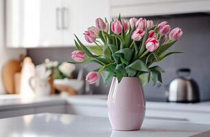 ai generado bonito rosado tulipanes en un florero en medio de un cocina foto
