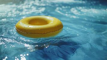 ai generado un amarillo piscina flotador anillo derivas en un Frío, azul nadando piscina foto