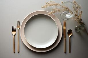 AI generated an empty dinner plate, silverware, and candle stand on grey table photo