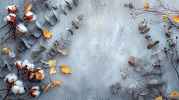 AI generated Eucalyptus Branches, Cotton Flowers, and Dried Leaves in a Frame on a Pastel Gray Background photo