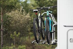 Bicycles are mounted on the motorhome. The concept of travel photo