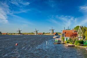 Windmills at Zaanse Schans in Holland. Zaandam, Netherlands photo