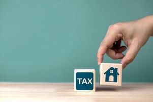 Real estate tax concepts and home purchase fees. with copy space photo