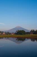 Beautiful Reflective Mount View with Blue Sky as a Background photo