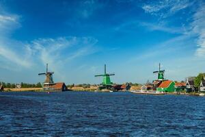 Windmills at Zaanse Schans in Holland. Zaandam, Netherlands photo