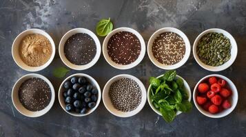 AI generated A variety of superfoods in bowls, showcasing nutritious seeds, powders, and fresh berries on a textured background photo