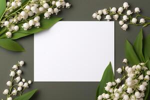 AI generated mockup white blank paper sheet with lilies of the valley flowers top view on grey background, floral template empty card flat lay for design with copy space photo