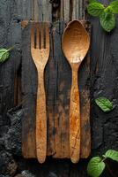 AI generated eco-friendly disposable tableware made of wood on a wooden background. the concept of recycling photo