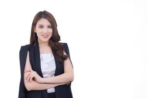 Aadult business asian confident woman is standing and arm crossing with smiling face in working room while isolated white background. photo