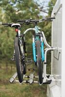 Bicycles are mounted on the motorhome. The concept of travel photo