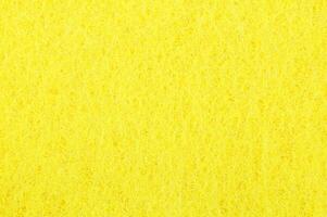 fondo de textura de esponja amarilla abstracta foto