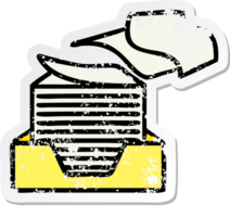 distressed sticker of a cute cartoon stacked papers png