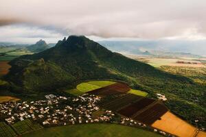 Bird's eye view of beautiful fields Islands of Mauritius and mountains photo