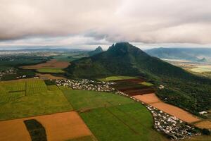 Bird's eye view of beautiful fields Islands of Mauritius and mountains photo