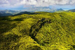 Bird's-eye view of the mountains and fields of the island of Mauritius.Landscapes Of Mauritius. photo